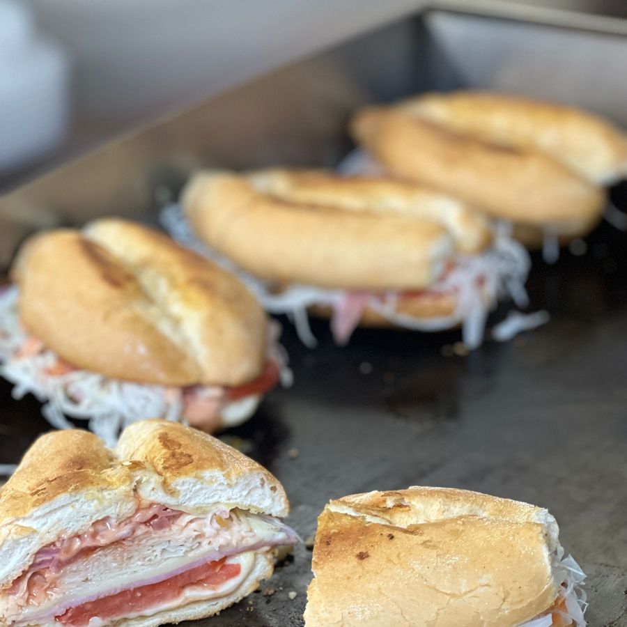 Sandwiches toasting on the grill